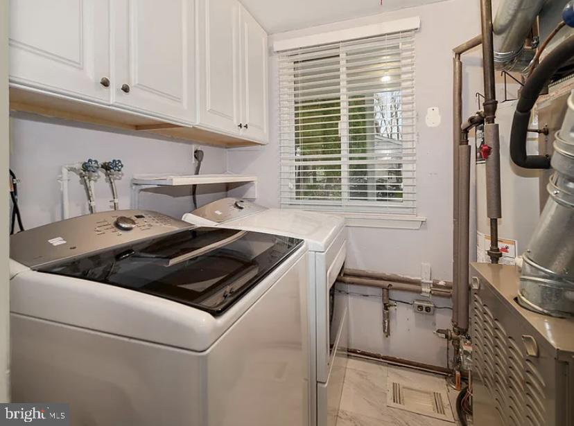 9481 Farewell Road Columbia, MD 21045 - Photo 11 of 18 a kitchen with a stove a sink and a window