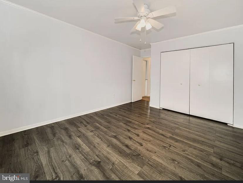9481 Farewell Road Columbia, MD 21045 - Photo 15 of 18 a view of an empty room with wooden floor