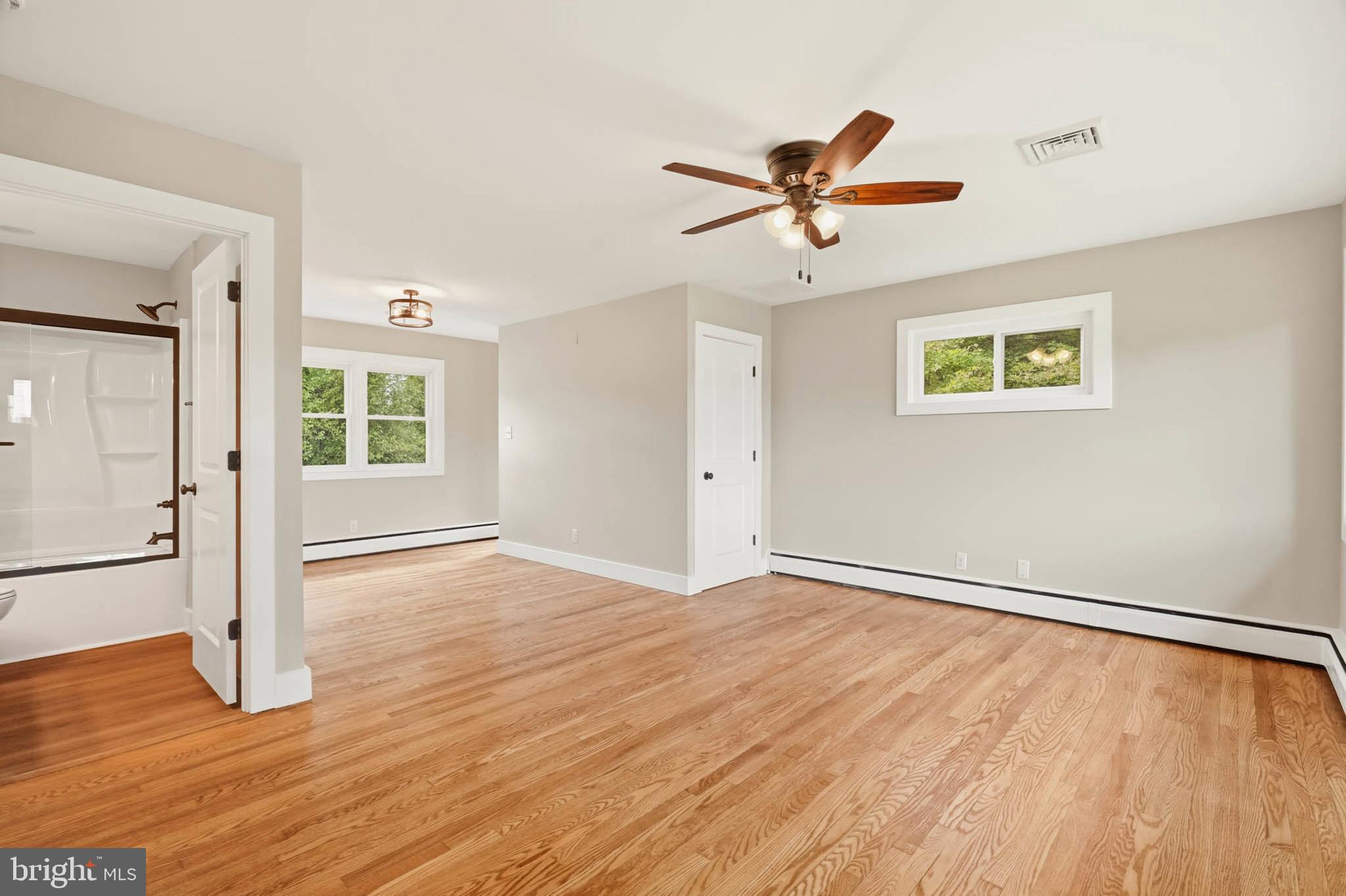 8643 Ridge Road Ellicott City, MD 21043 - Photo 5 of 36 Living/Dining w/ refinished hardwood floors
