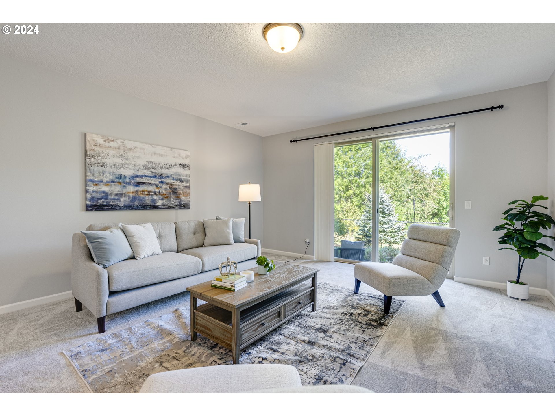 264 North Green Gables Loop Ridgefield, WA 98642 - Photo 20 of 46 a living room with furniture and a large window