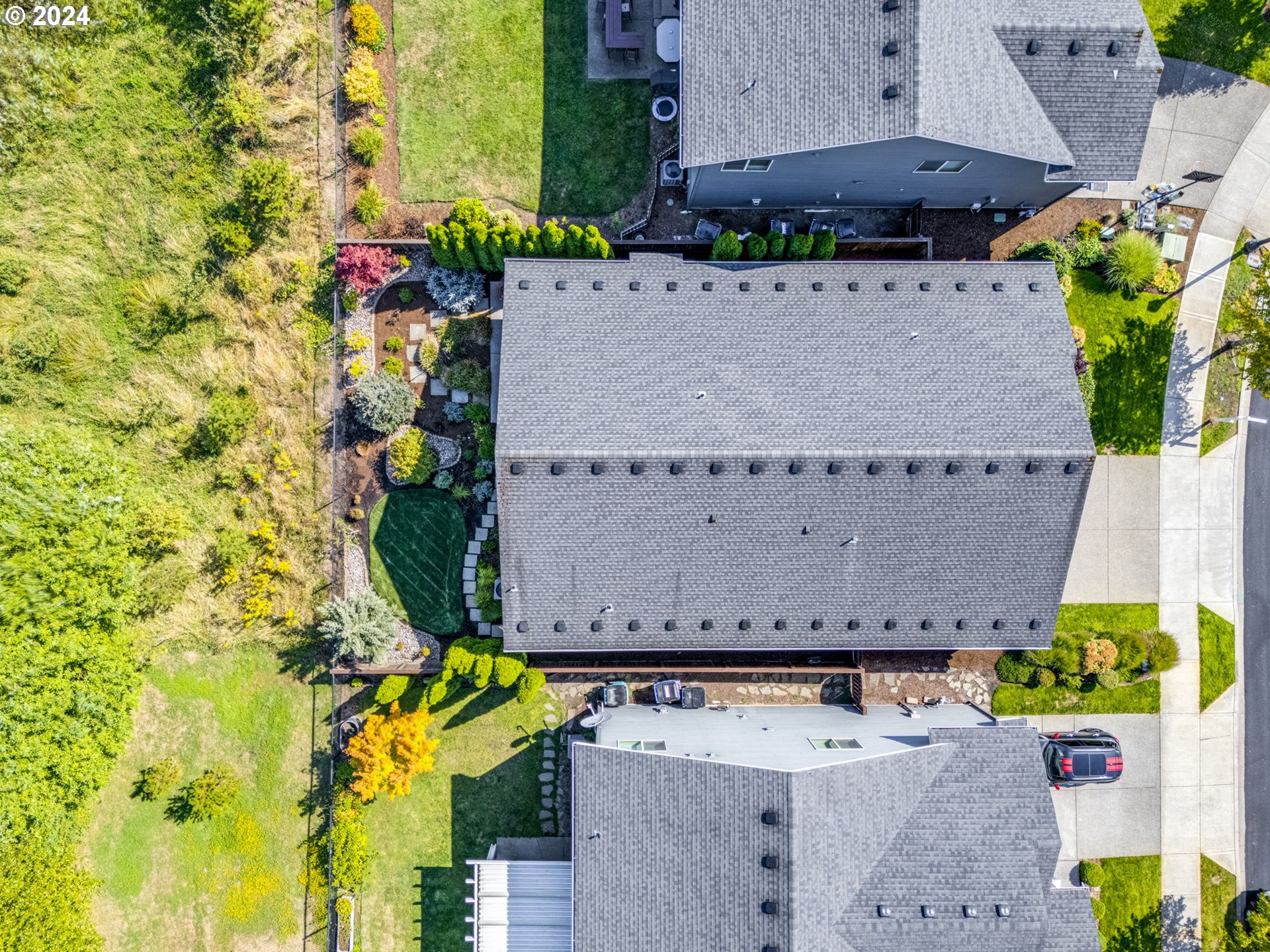 264 North Green Gables Loop Ridgefield, WA 98642 - Photo 29 of 46 an aerial view of a house with a yard