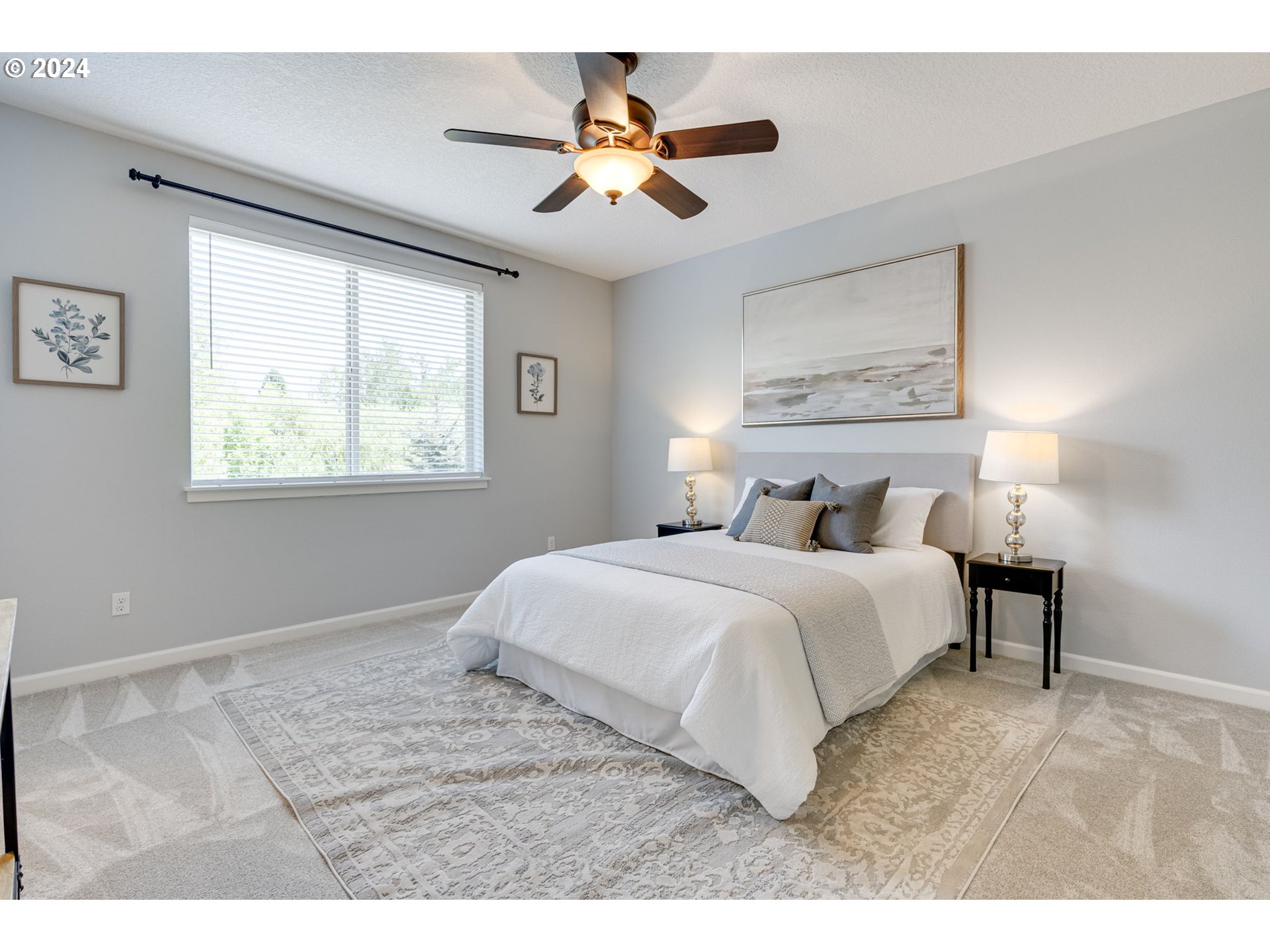 264 North Green Gables Loop Ridgefield, WA 98642 - Photo 39 of 46 a bedroom with a bed and a painting on the wall