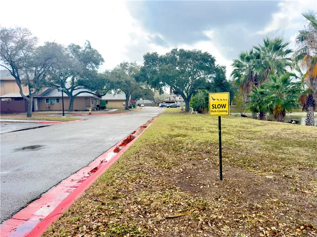 a sign board with parking space