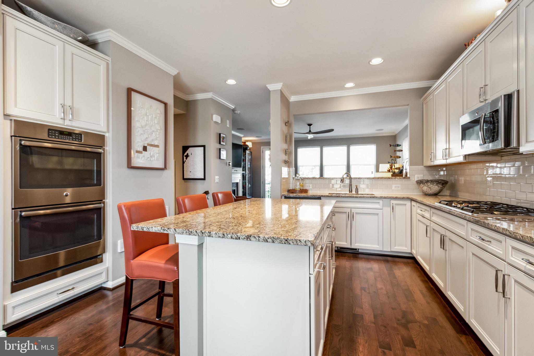 16008 Madison Ridge Place Gainesville, VA 20155 - Photo 8 of 35 Kitchen views open to Family Room