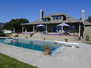 6628 Bennett Valley Road Santa Rosa, CA 95404 - Photo 2 of 9 a front view of a house with swimming pool and furniture