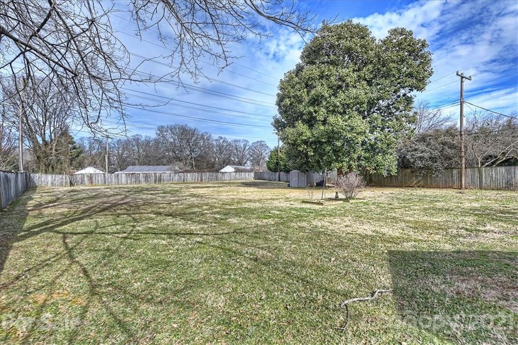1114 Sedgefield Road Charlotte, NC 28209 - Photo 4 of 9 a view of outdoor space with trees all around