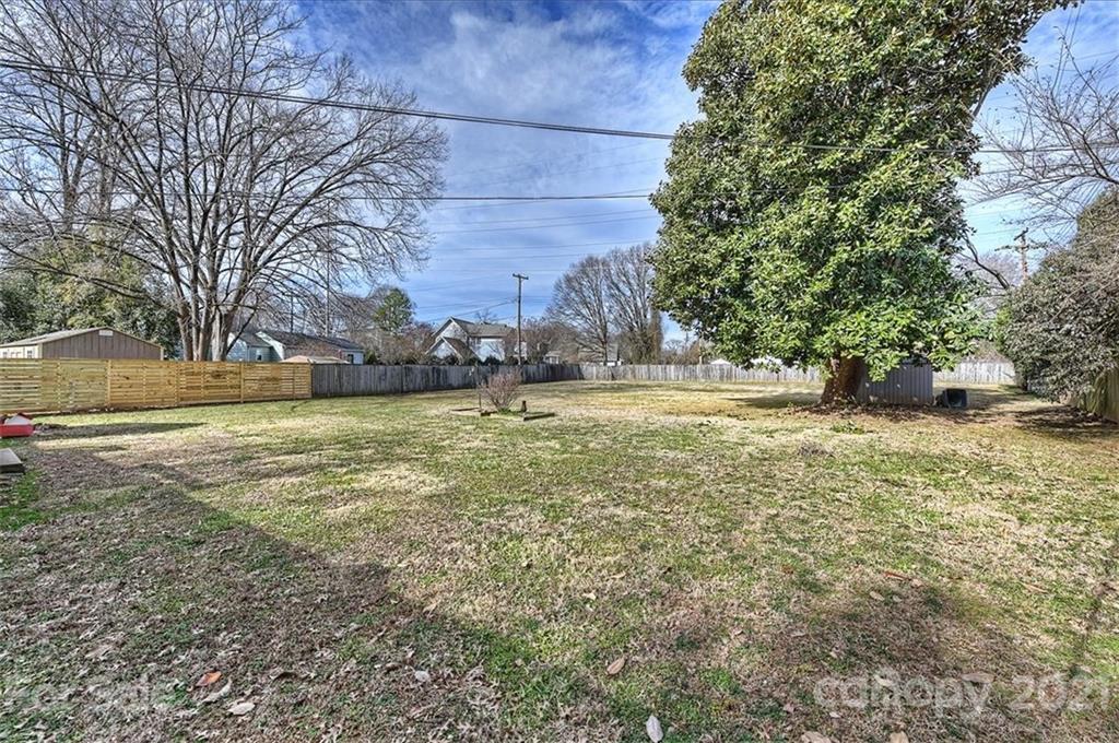 1114 Sedgefield Road Charlotte, NC 28209 - Photo 5 of 9 a view of outdoor space with trees all around