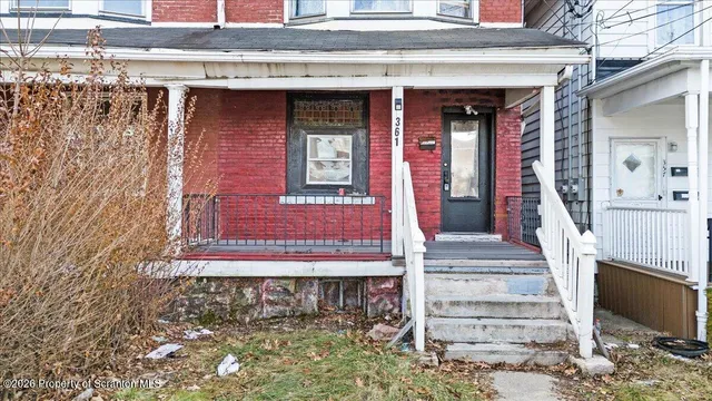a front view of a house with entryway