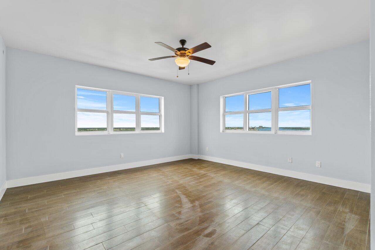 2650 Lake Shore Drive, Unit 2001 Riviera Beach, FL 33404 - Photo 12 of 49 Master Suite w Extra End Unit Windows