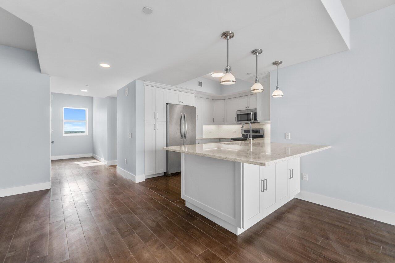 2650 Lake Shore Drive, Unit 2001 Riviera Beach, FL 33404 - Photo 5 of 49 Kitchen Area