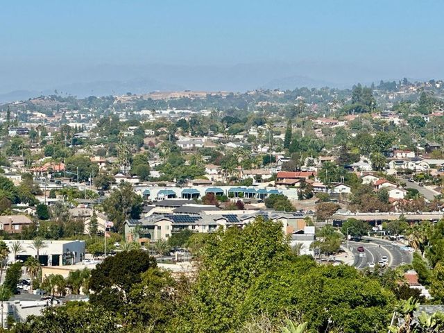 a storage room with lots of furniture and clutter