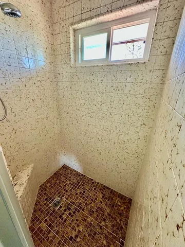 a view of a balcony with an ocean view