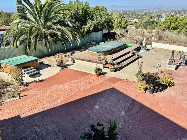 a view of a terrace with wooden floor