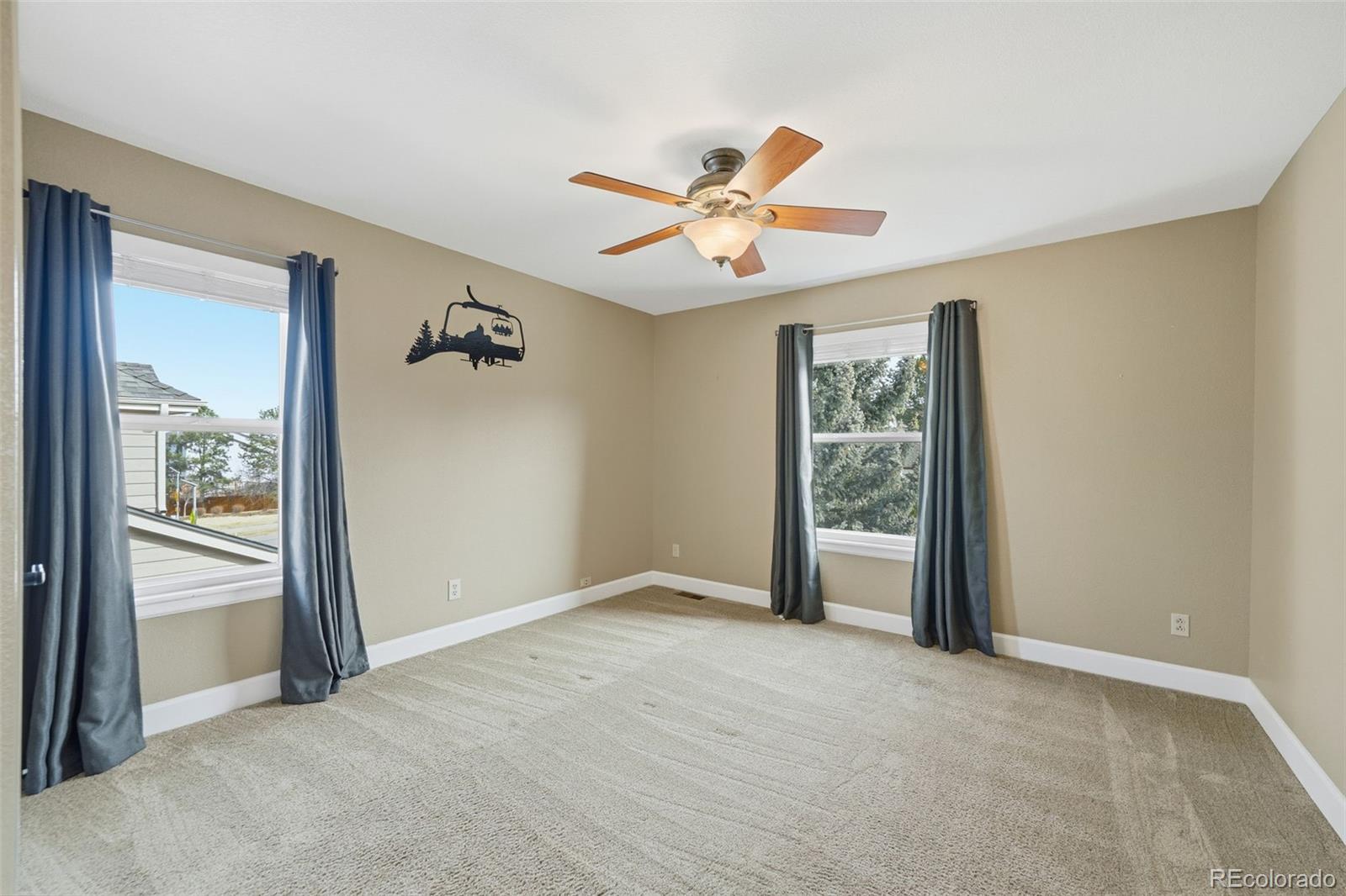 6879 Ingleton Drive Castle Pines, CO 80108 - Photo 33 of 50 a view of an empty room with a window