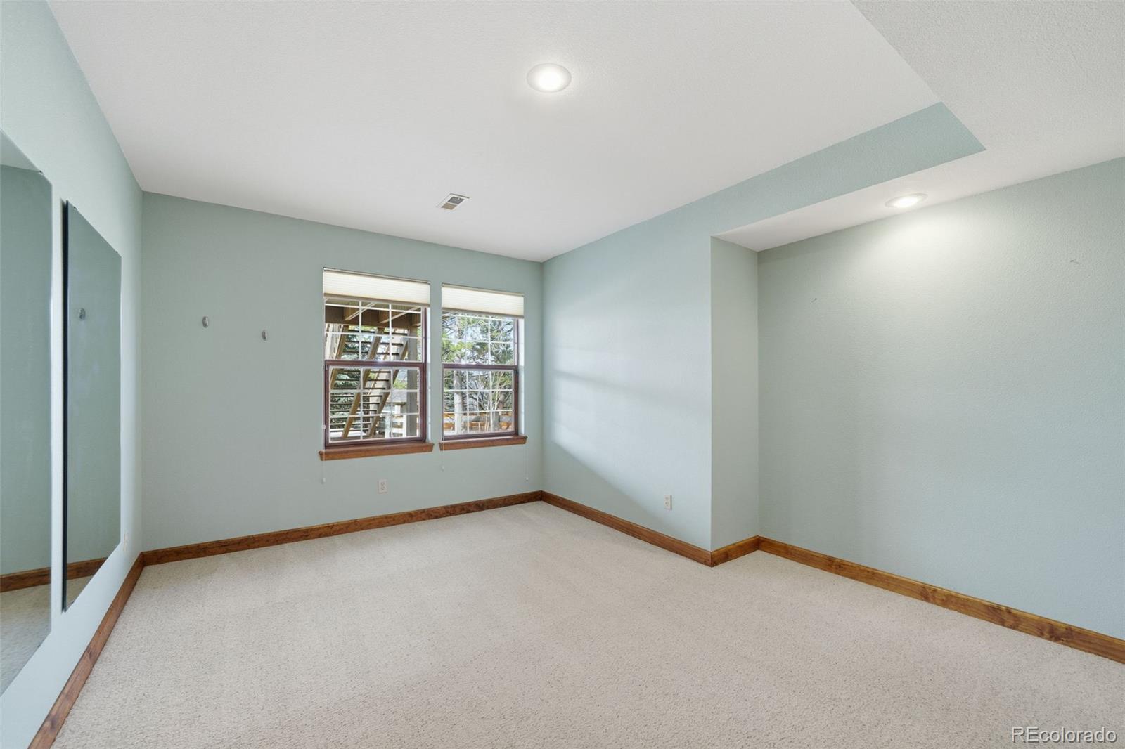 6879 Ingleton Drive Castle Pines, CO 80108 - Photo 42 of 50 a view of an empty room with a window
