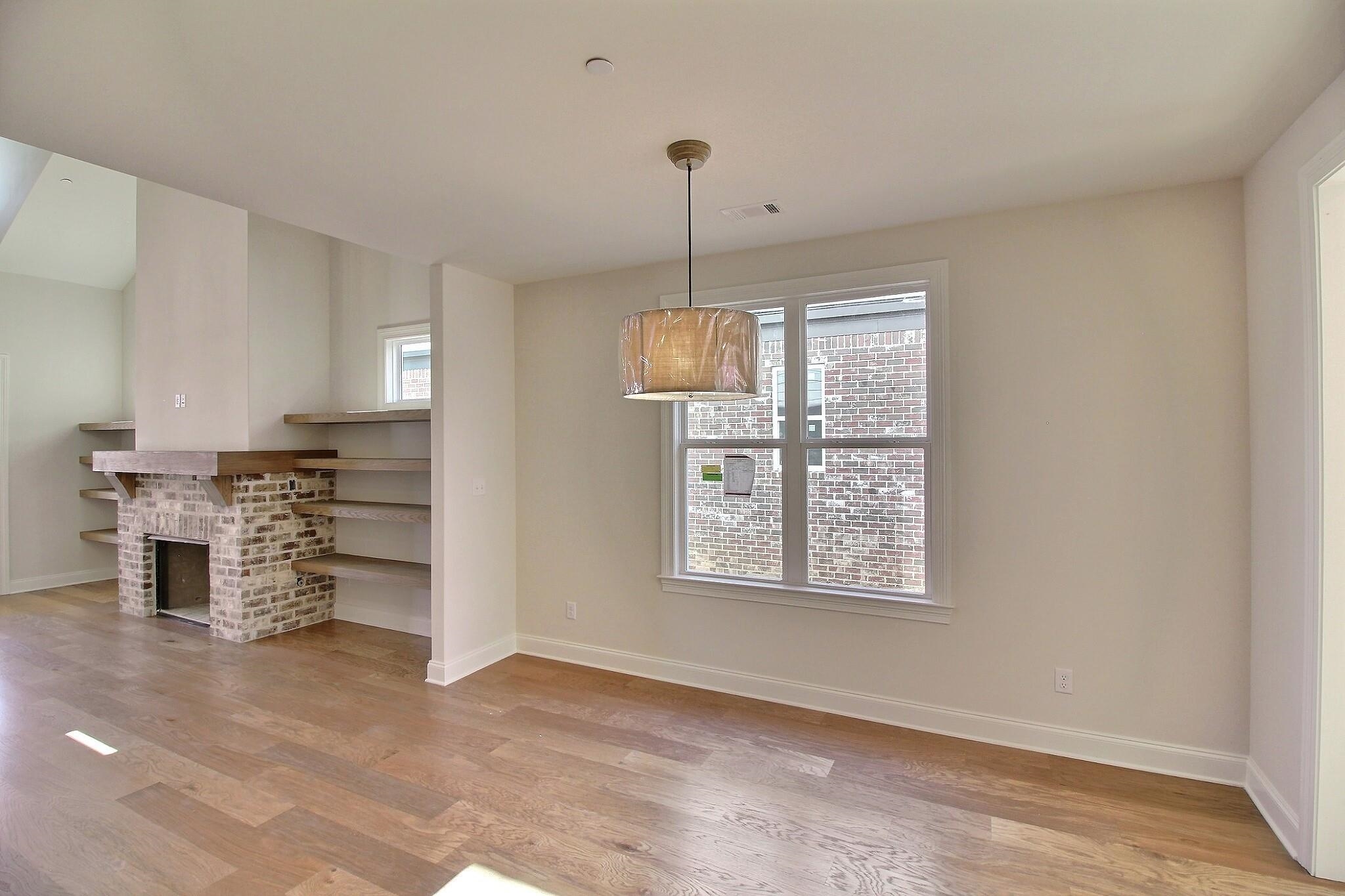 110 Rambling Rex Trail Collierville, TN 38017 - Photo 17 of 36 an empty room with windows and cabinet