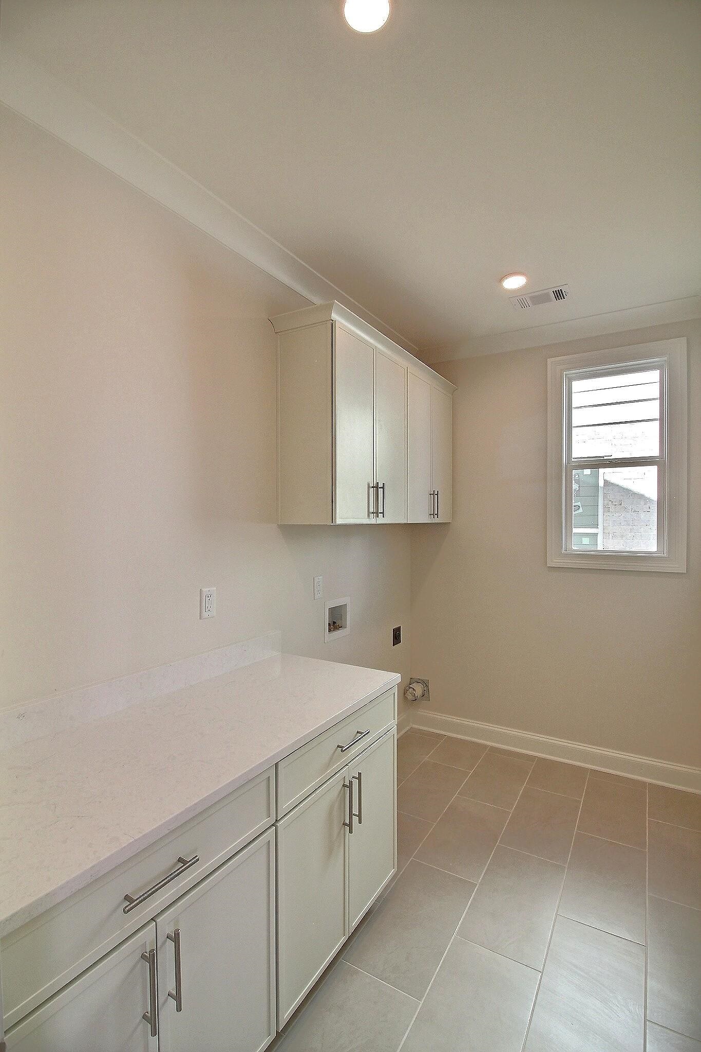 110 Rambling Rex Trail Collierville, TN 38017 - Photo 23 of 36 a utility room with cabinets