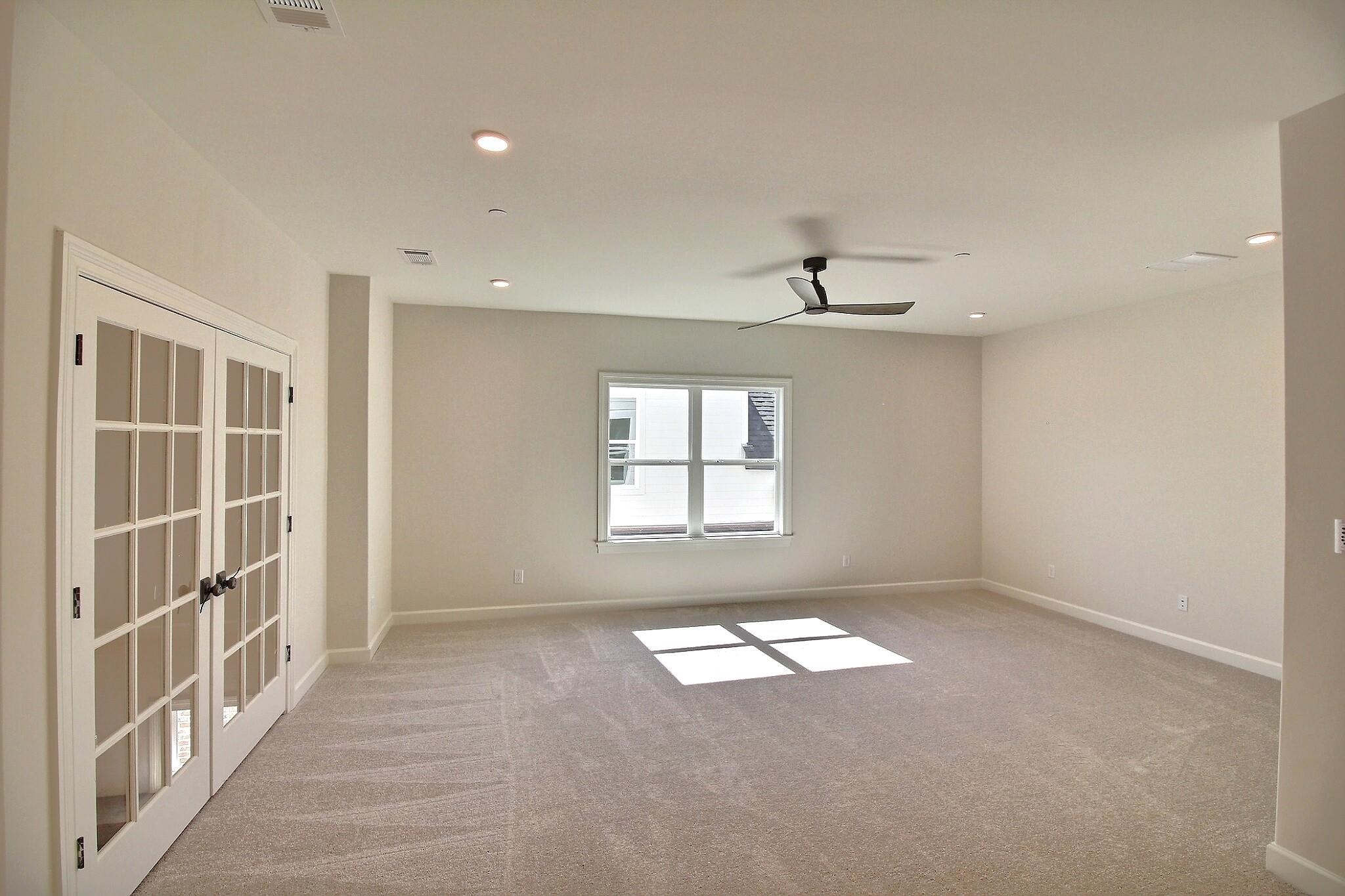 110 Rambling Rex Trail Collierville, TN 38017 - Photo 29 of 36 an empty room with windows and entrance