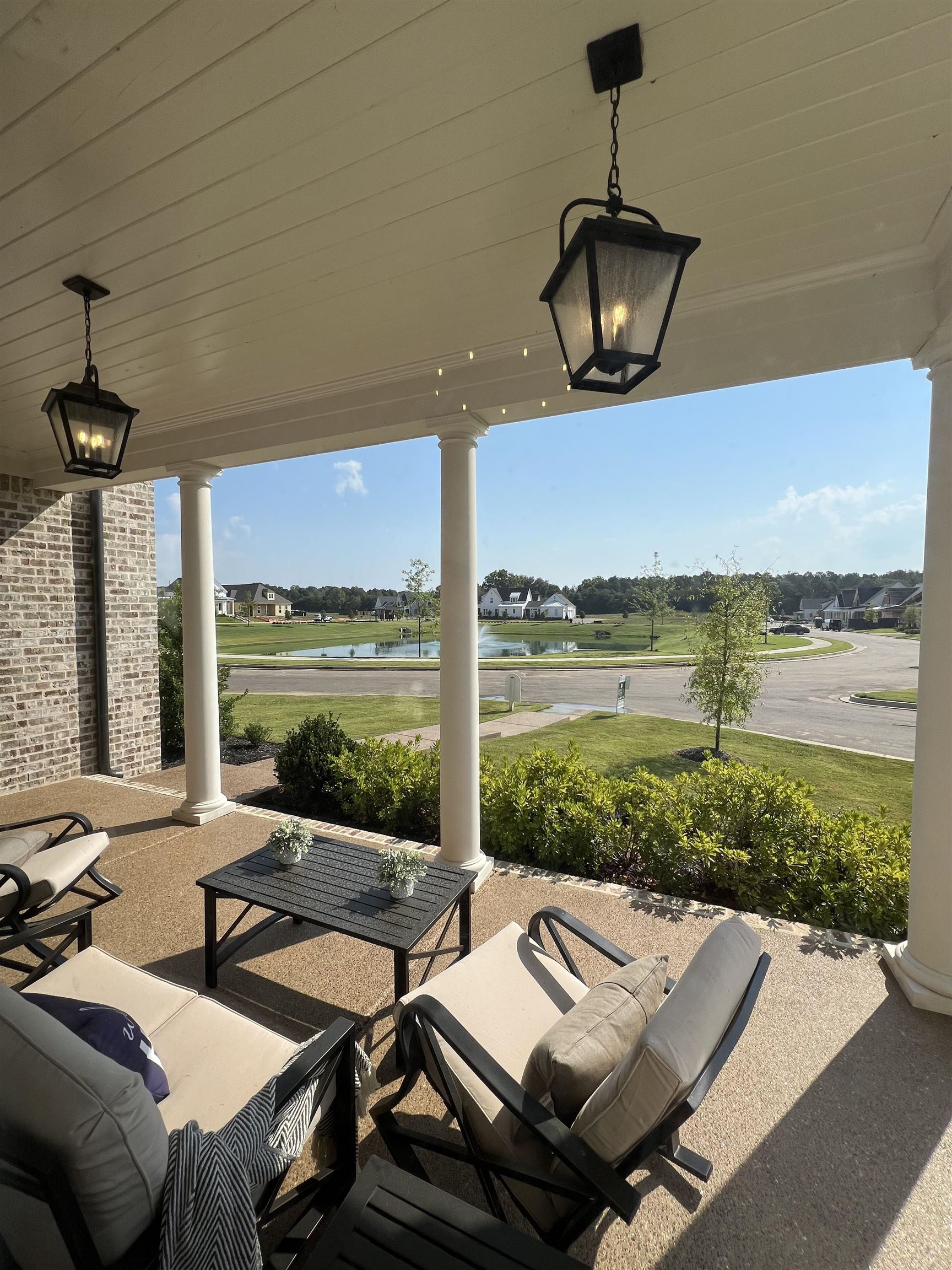 110 Rambling Rex Trail Collierville, TN 38017 - Photo 3 of 37 View of patio / terrace featuring a water view