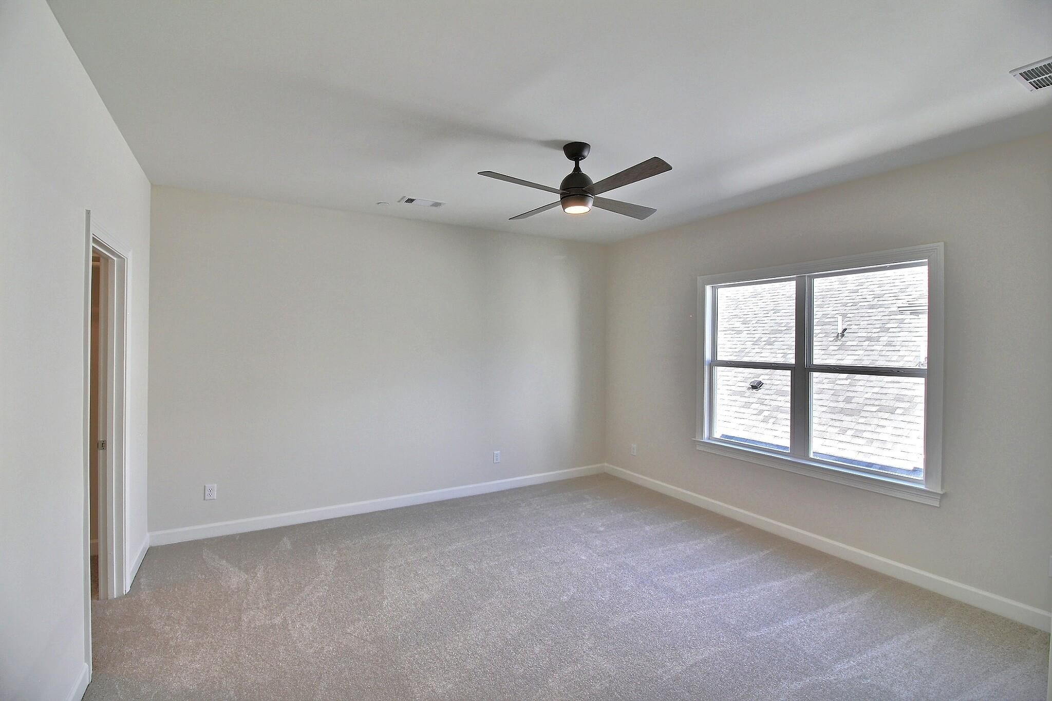 110 Rambling Rex Trail Collierville, TN 38017 - Photo 32 of 36 a view of an empty room with a window
