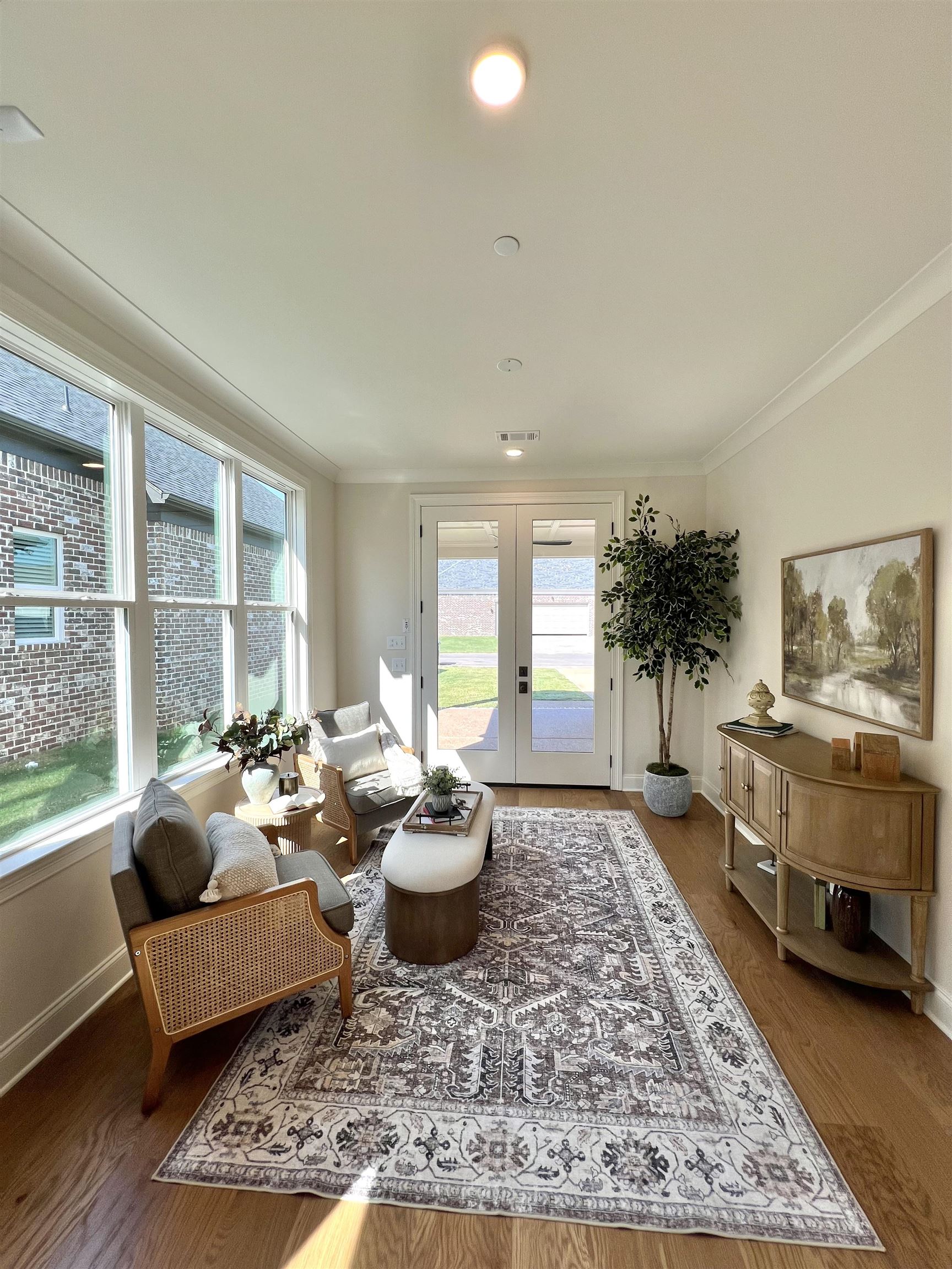 110 Rambling Rex Trail Collierville, TN 38017 - Photo 10 of 36 a living room with furniture and a potted plant