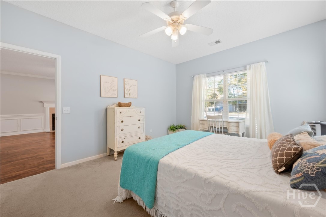 83 Fellwood Drive Rincon, GA 31326 - Photo 19 of 40 Spacious primary bedroom suite.