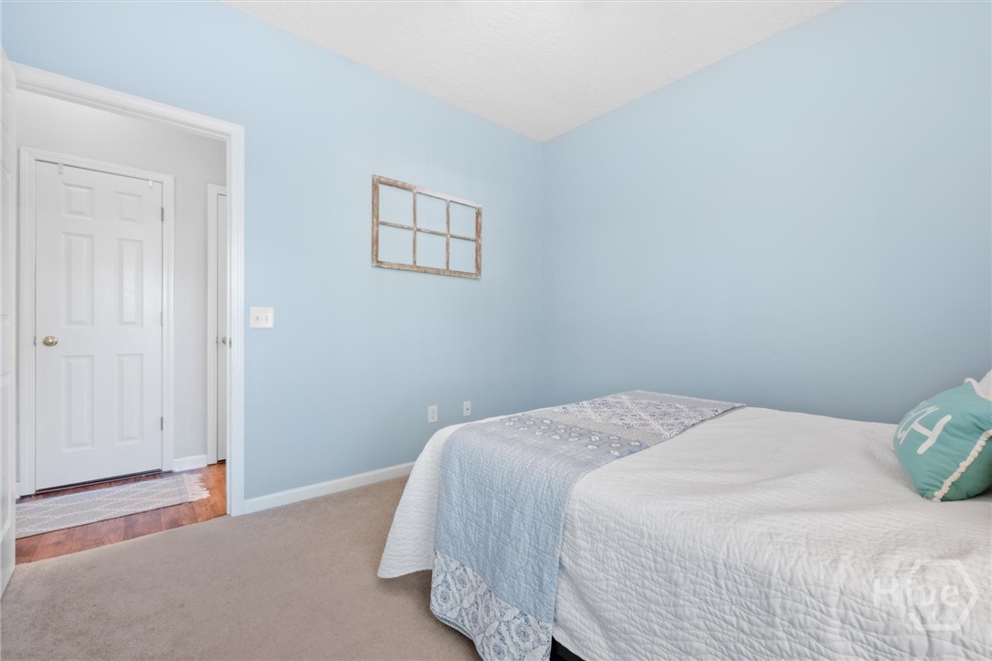 83 Fellwood Drive Rincon, GA 31326 - Photo 28 of 40 The third bedroom also features a double closet.