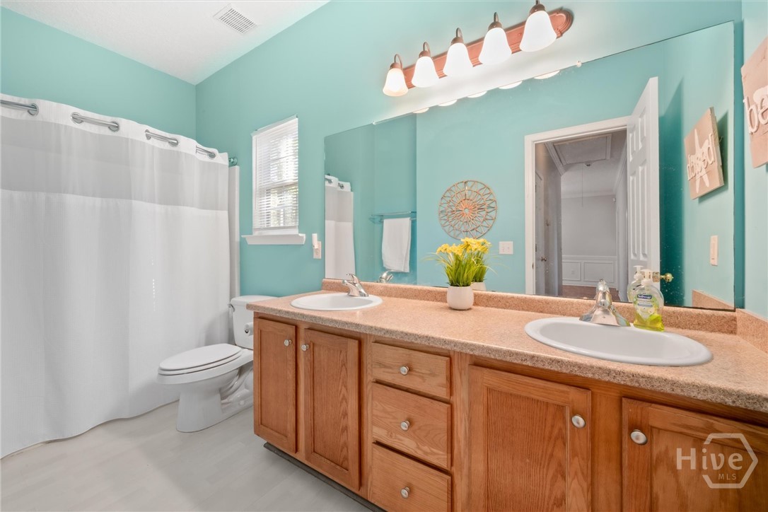 83 Fellwood Drive Rincon, GA 31326 - Photo 30 of 40 Second full bath with a shower over tub.