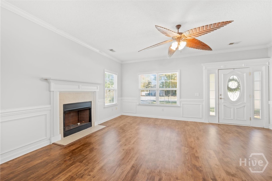 83 Fellwood Drive Rincon, GA 31326 - Photo 7 of 40 Living room with cozy fireplace and lighted fan.