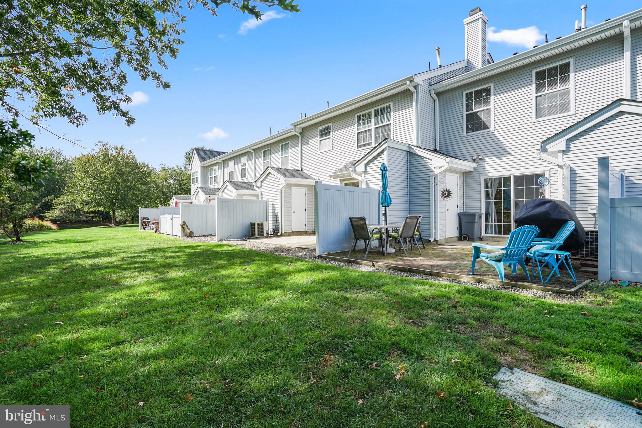 157 Setter Place Freehold, NJ 07728 - Photo 21 of 22 a view of a house with backyard and porch