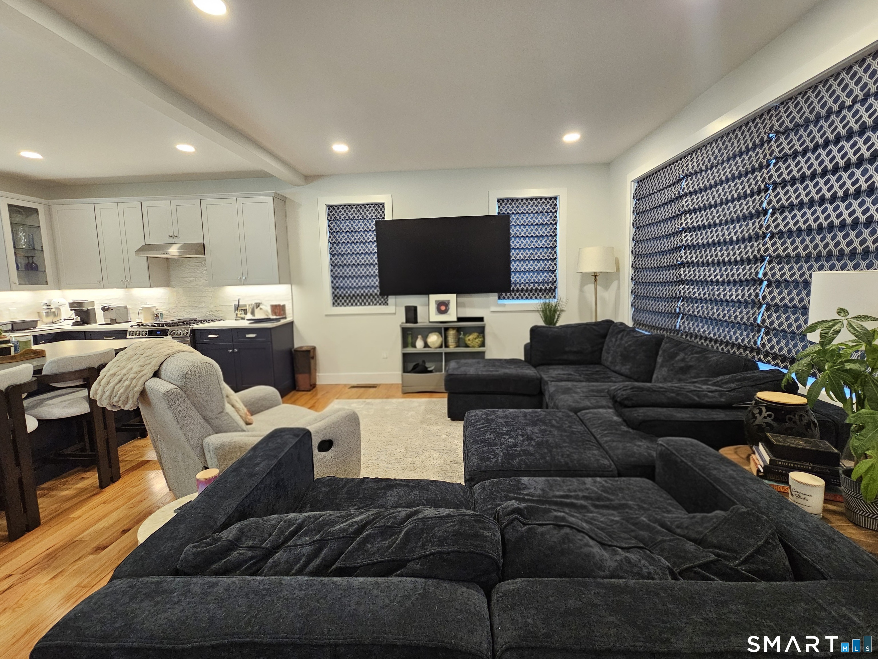 23 Ivy Hill Road, Unit 23 Waterford, CT 06385 - Photo 15 of 28 a living room with furniture and a flat screen tv