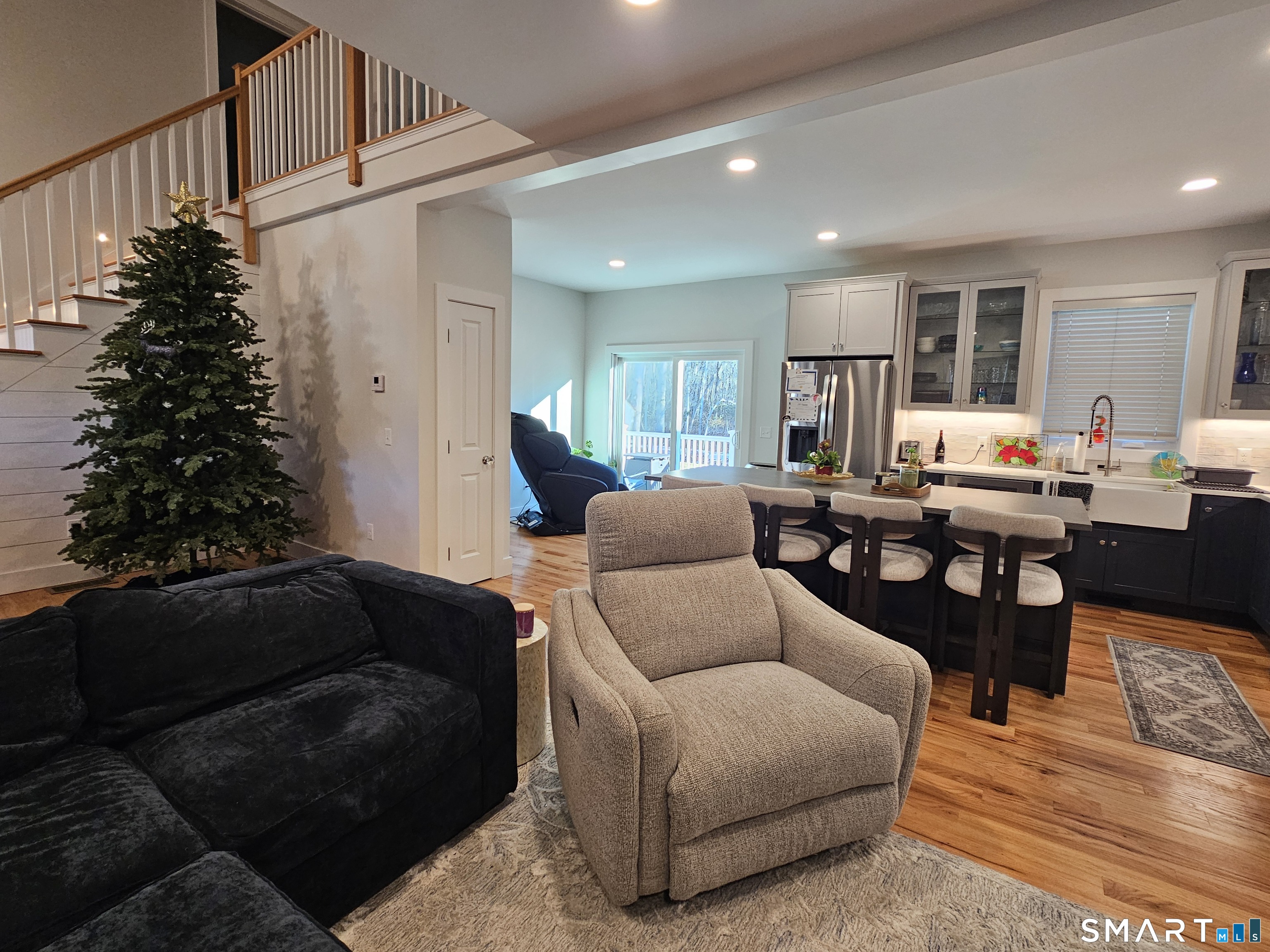23 Ivy Hill Road, Unit 23 Waterford, CT 06385 - Photo 16 of 28 a living room with furniture plant and a window