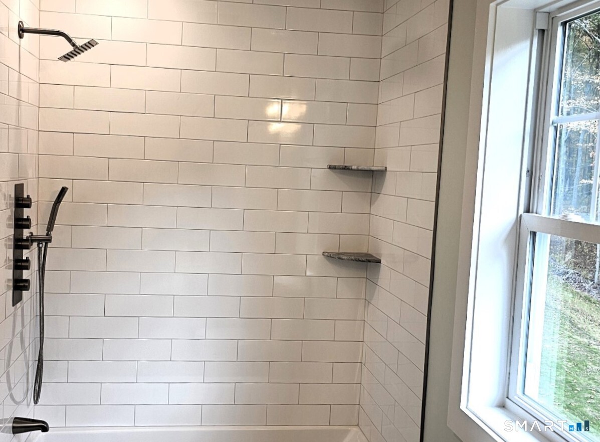 23 Ivy Hill Road, Unit 23 Waterford, CT 06385 - Photo 17 of 28 a bathroom with a shower