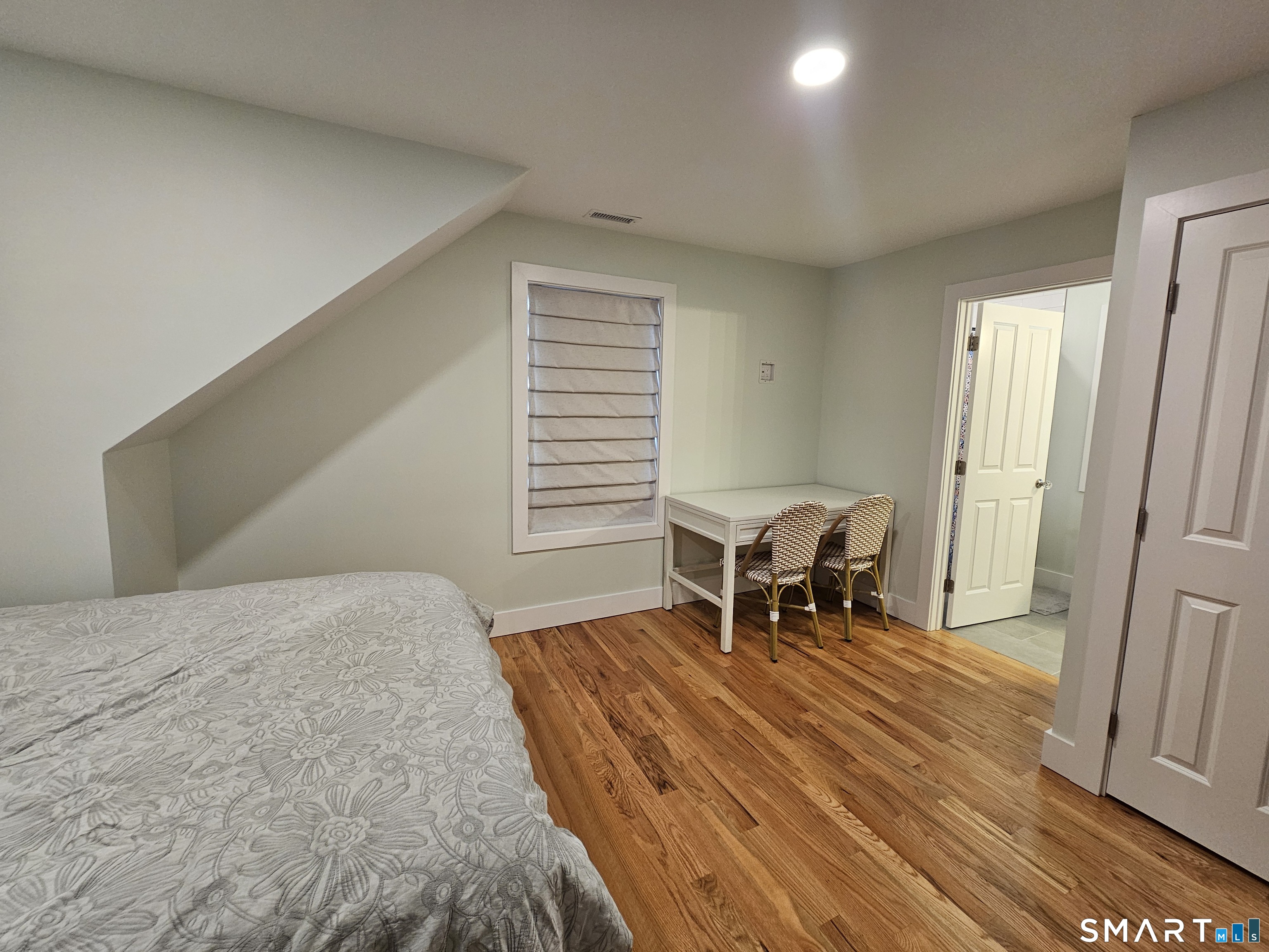 23 Ivy Hill Road, Unit 23 Waterford, CT 06385 - Photo 23 of 28 a bedroom with a bed and a window