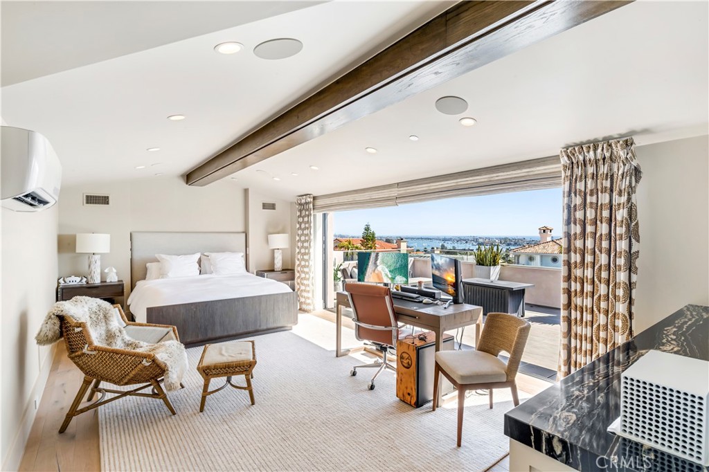 660 Kings Road Newport Beach, CA 92663 - Photo 29 of 41 a living room with furniture and a floor to ceiling window