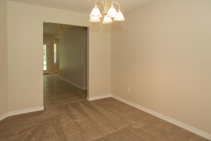 6805 Fernandina Road Navarre, FL 32566 - Photo 12 of 29 an empty room with a bathroom