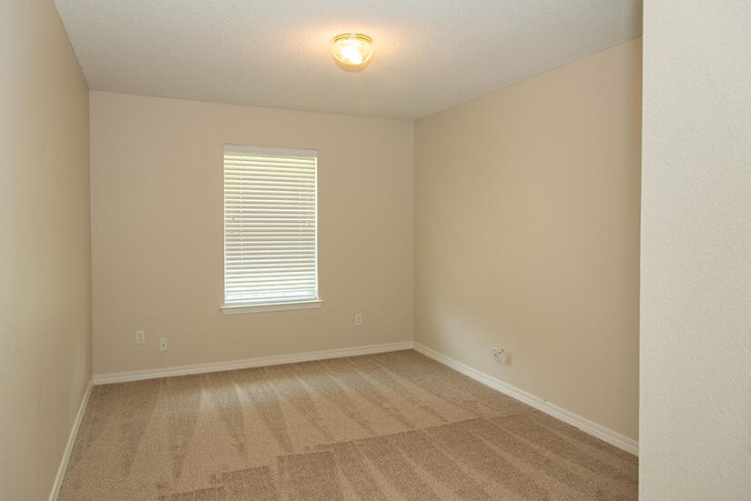 6805 Fernandina Road Navarre, FL 32566 - Photo 18 of 29 an empty room with a window