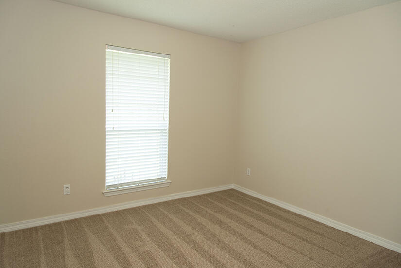 6805 Fernandina Road Navarre, FL 32566 - Photo 22 of 29 an empty room with a window