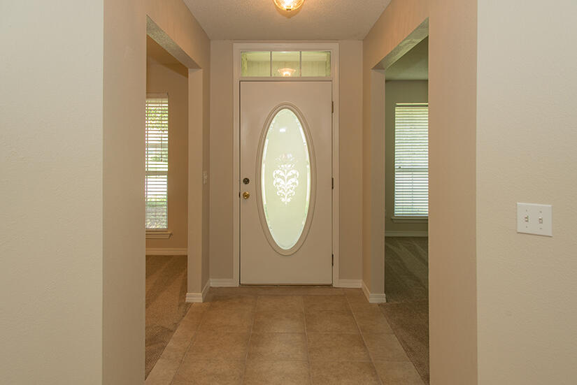 6805 Fernandina Road Navarre, FL 32566 - Photo 3 of 29 a view of a livingroom with wooden floor and a window