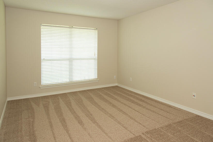 6805 Fernandina Road Navarre, FL 32566 - Photo 9 of 29 an empty room with a window