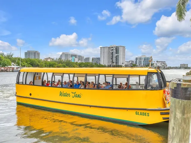 a view of a swimming pool with an outdoor seating and a garden