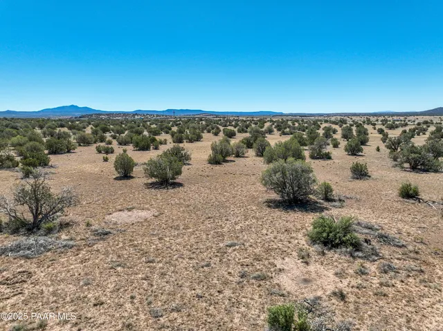 a view of a lake with beach and ocean view