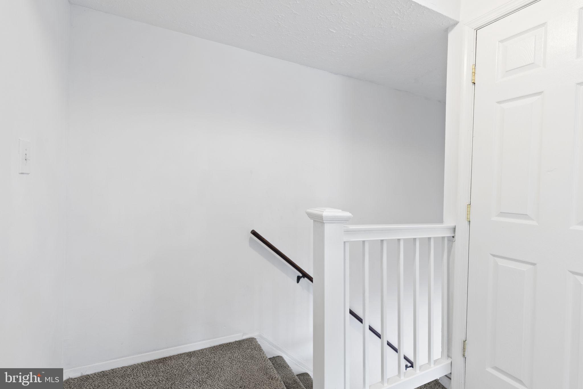 483 Moores Mill Road, Unit C Bel Air, MD 21014 - Photo 11 of 19 a view of a hallway with staircase