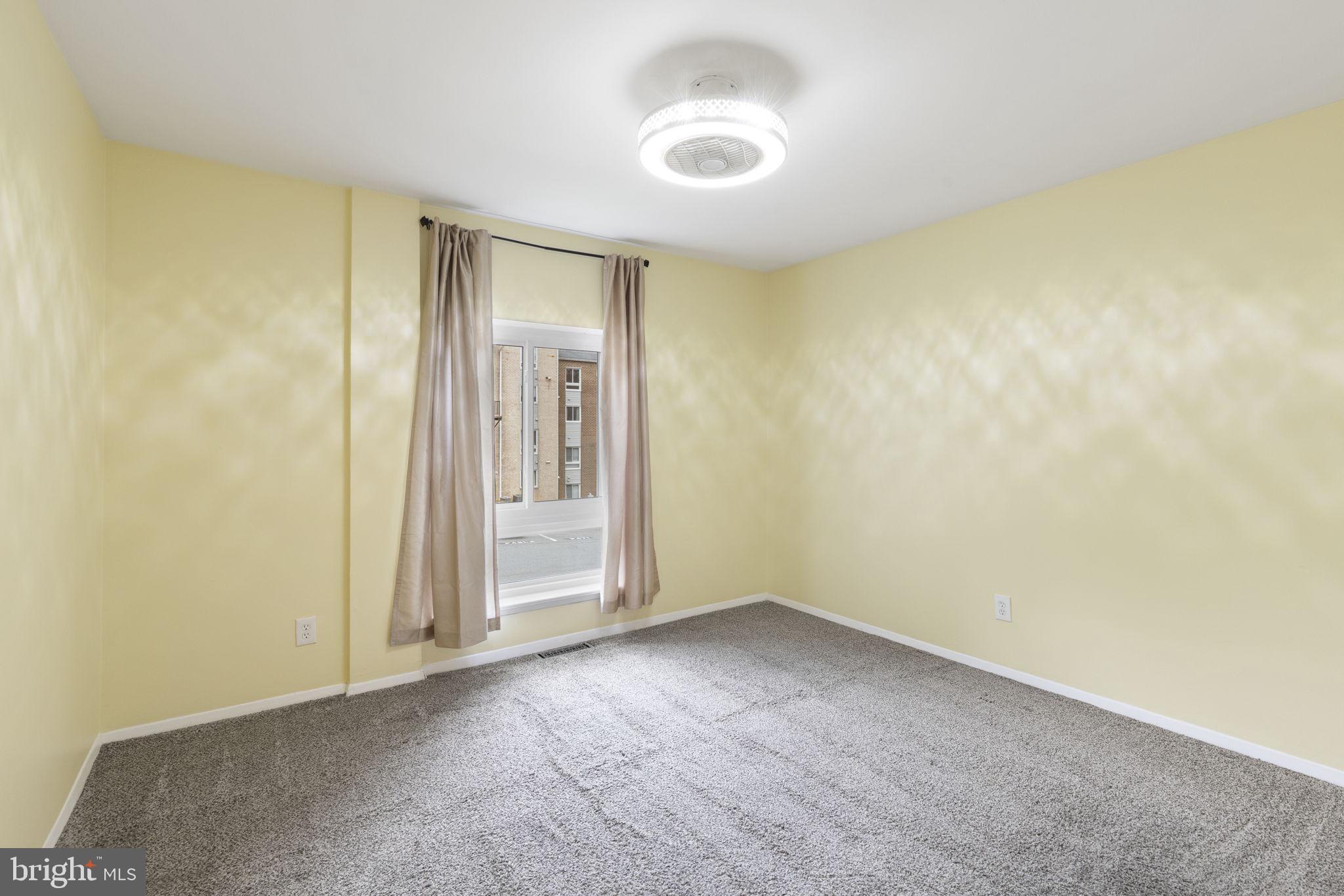 483 Moores Mill Road, Unit C Bel Air, MD 21014 - Photo 12 of 19 an empty room with a empty space and a window