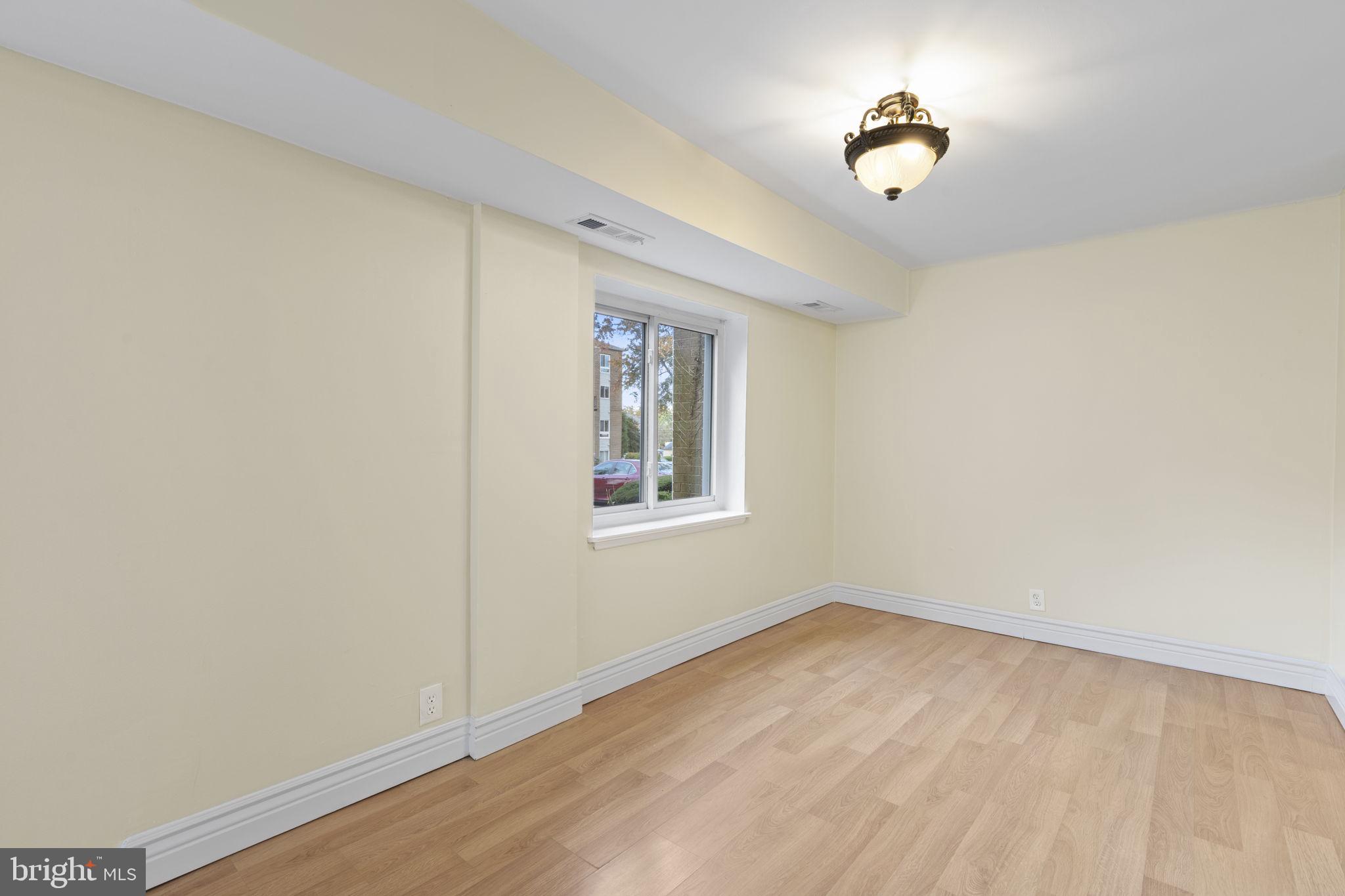483 Moores Mill Road, Unit C Bel Air, MD 21014 - Photo 6 of 19 a view of an empty room with a window