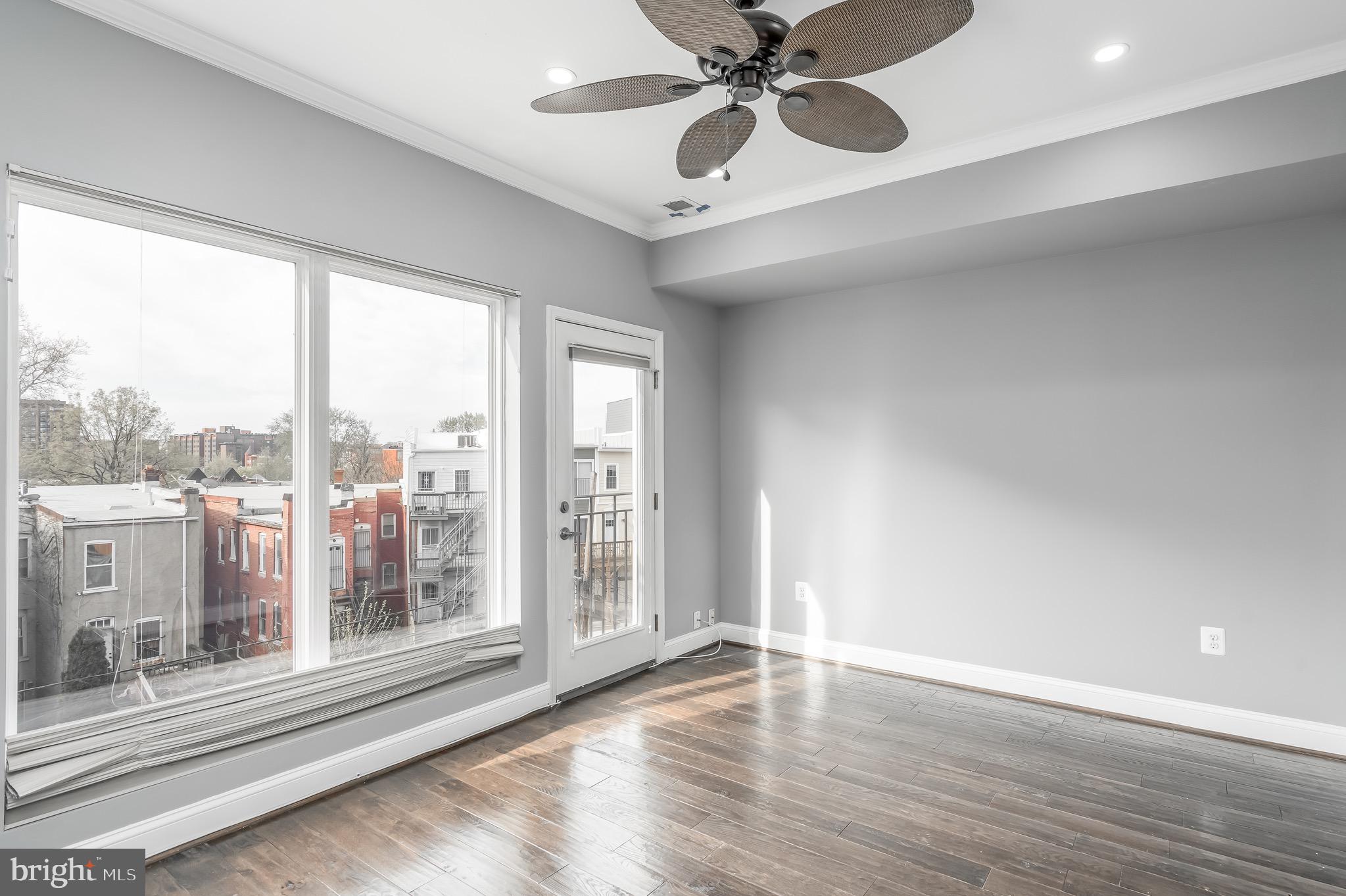29 Q Street Northeast, Unit 2 Washington, DC 20002 - Photo 13 of 28 Master bedroom, faces south w/ a juliet balcony.
