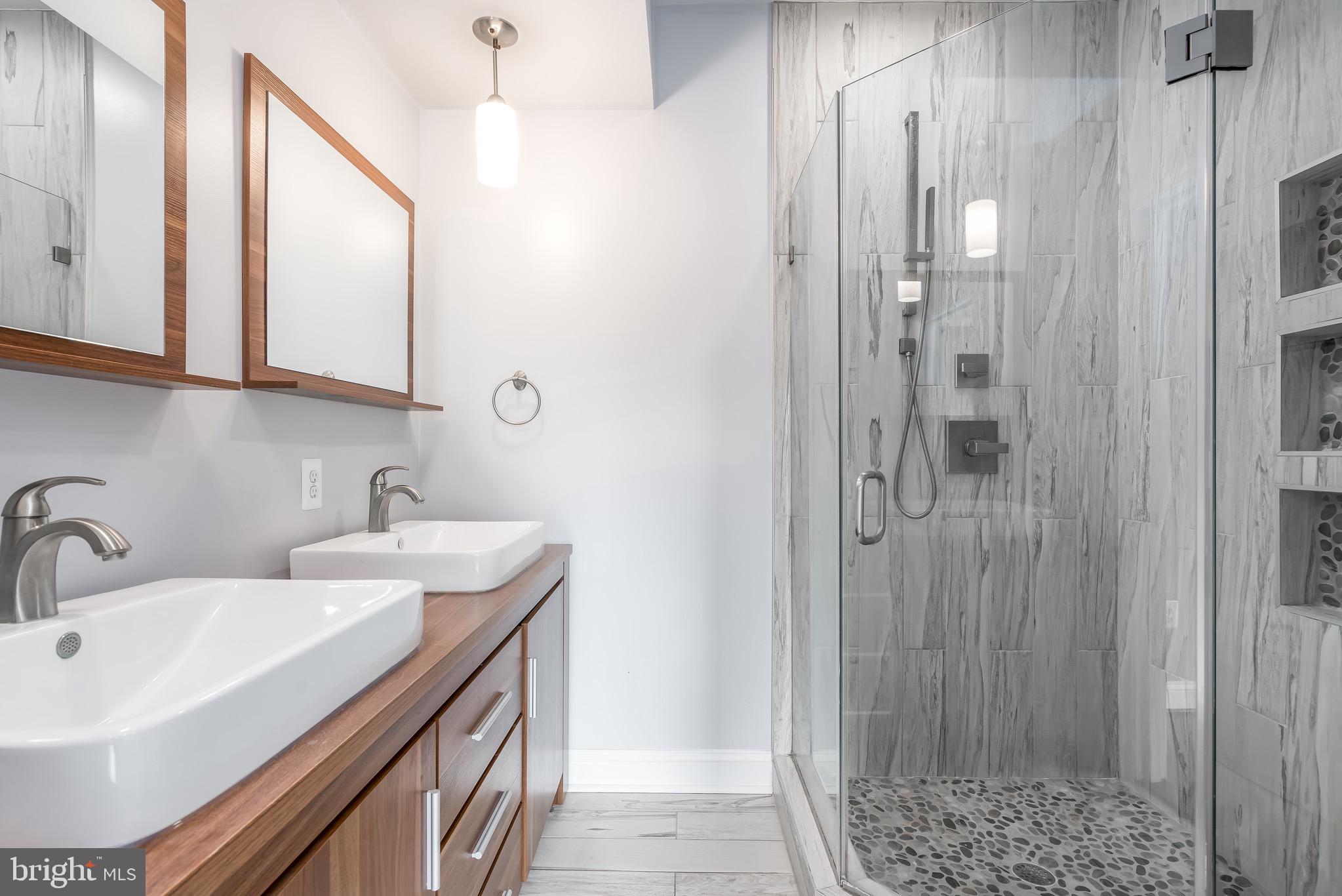 29 Q Street Northeast, Unit 2 Washington, DC 20002 - Photo 16 of 28 Double sink vanity, rain fall shower.