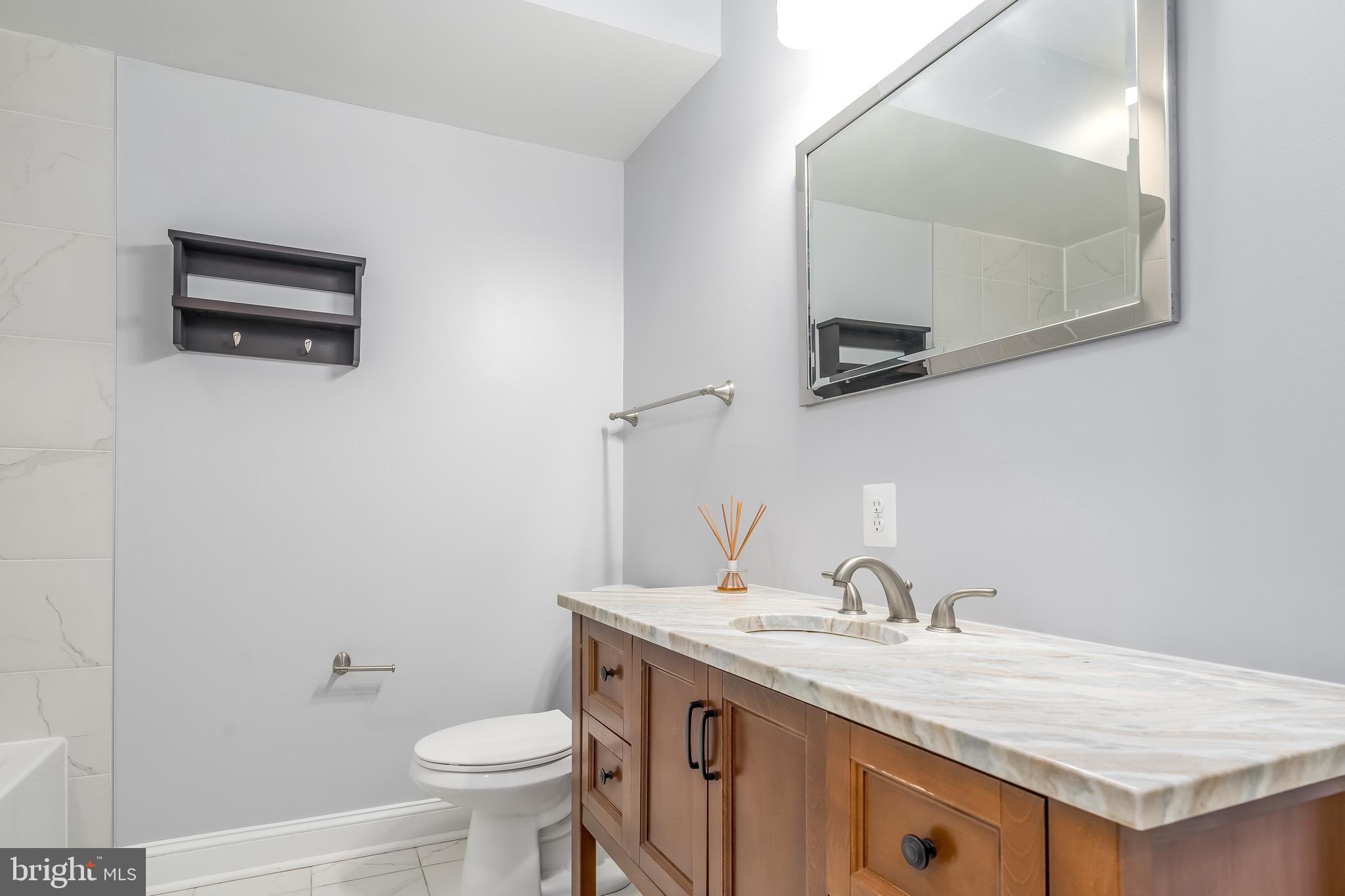 29 Q Street Northeast, Unit 2 Washington, DC 20002 - Photo 20 of 28 Full bath #3, adjacent to bedroom #2.