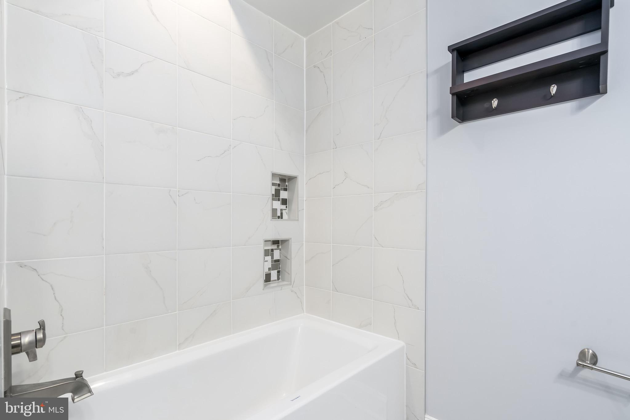 29 Q Street Northeast, Unit 2 Washington, DC 20002 - Photo 21 of 28 Bathtub in full bath #3.