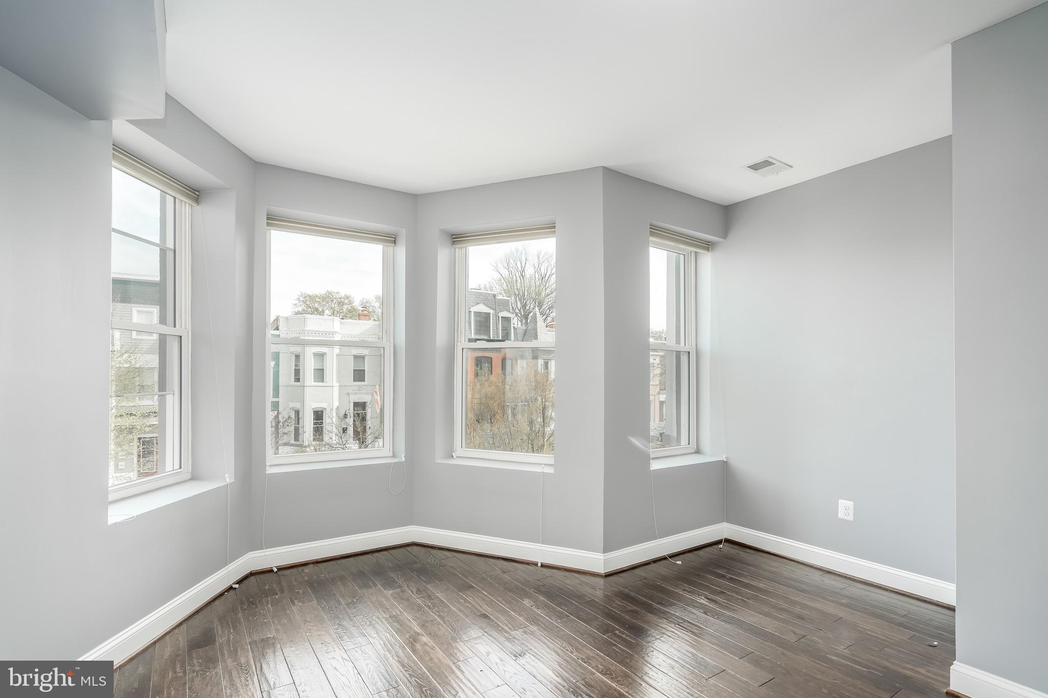 29 Q Street Northeast, Unit 2 Washington, DC 20002 - Photo 23 of 28 Bedroom #2 with a bay window.